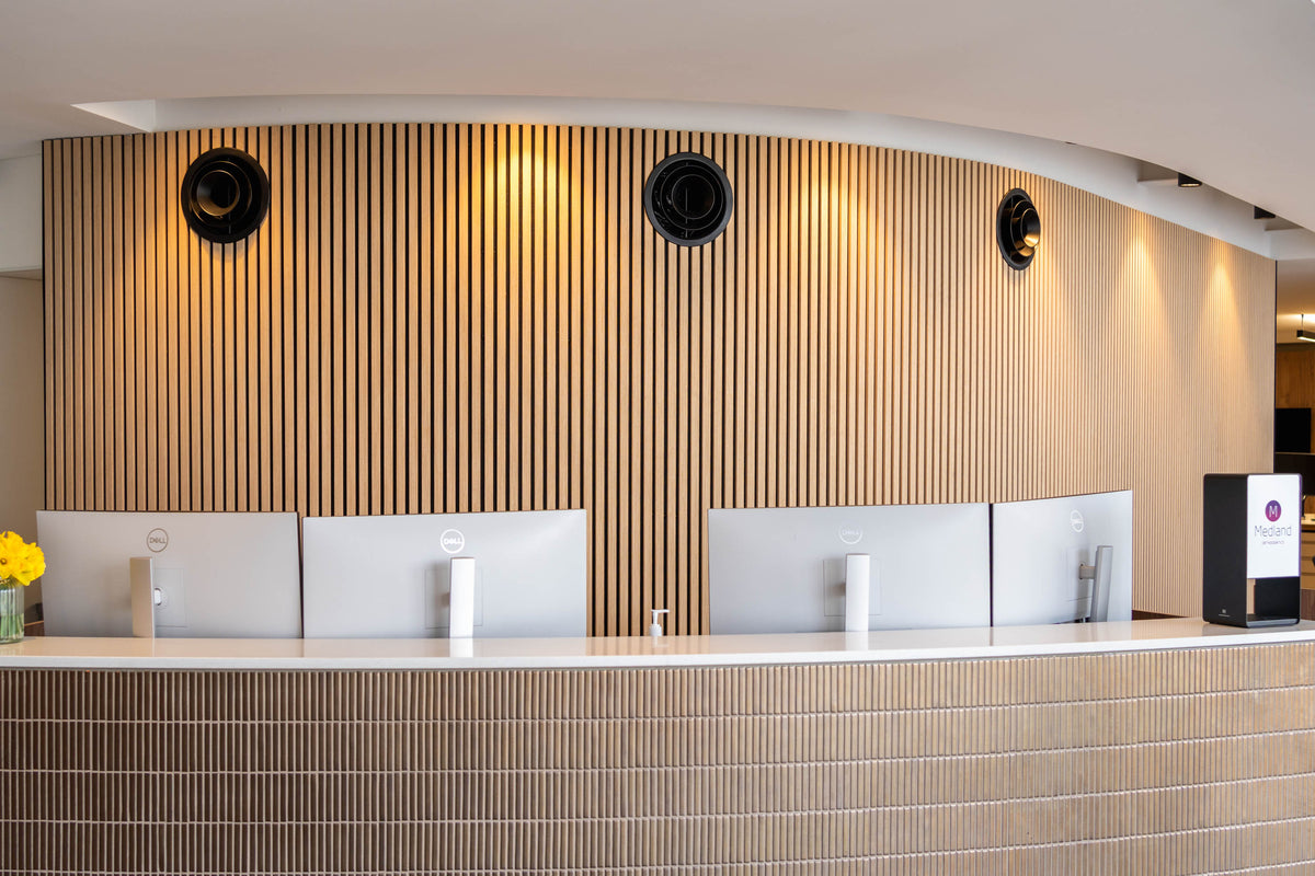 Oak slats behind reception